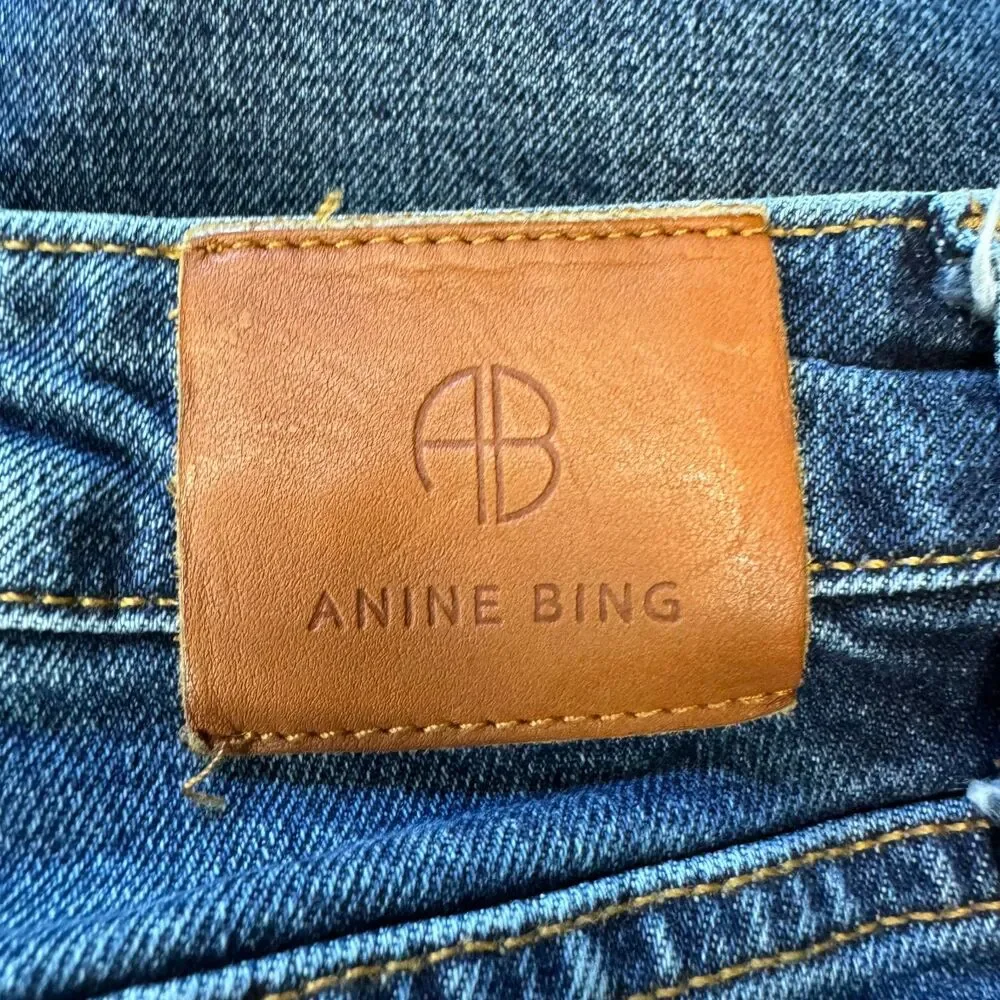 ANINE BING woman's size 31 Lara mid rise indigo raw hem ankle button fly jeans